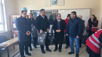 Konya’da ayakkabı ve elbise dağıtıldı