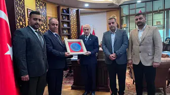 Görevden alınan Konya İl Başkanı oğullarıyla Bahçeli’yi ziyaret etti