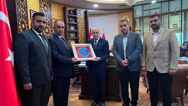 Görevden alınan Konya İl Başkanı oğullarıyla Bahçeli’yi ziyaret etti
