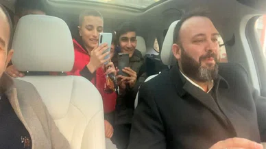 Başkan adayı çocukları  TOGG ile gezdirdi