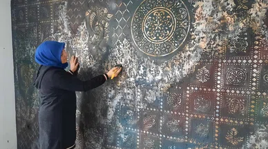 İçinde uhde kalmıştı!..Tuvale dönüştürdüğü ev ve iş yerlerinin duvarlarını bakın nasıl renklendirdi!