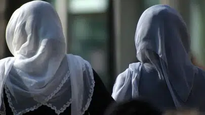 Başörtüsü yasağı yaygınlaşıyor! Uluslararası Demokratlar Birliği'nden yasaklara tepki