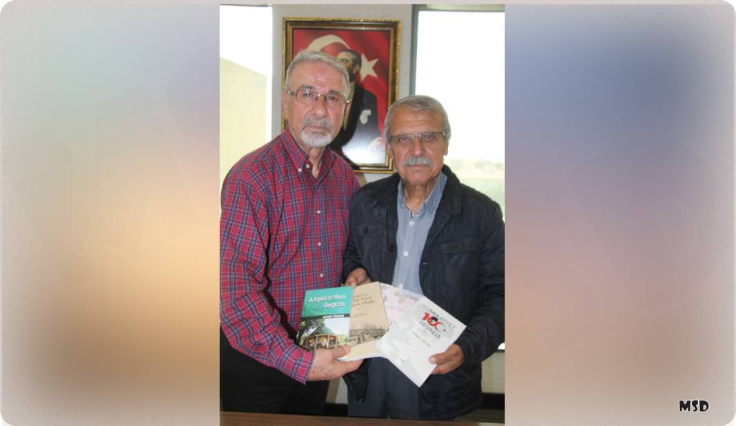 Üresin, Yıldız’a kitaplarını imzaladı 1