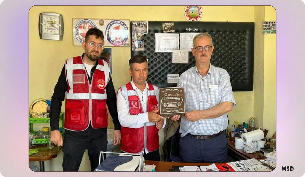 Uzun’a teşekkür plaketi 2